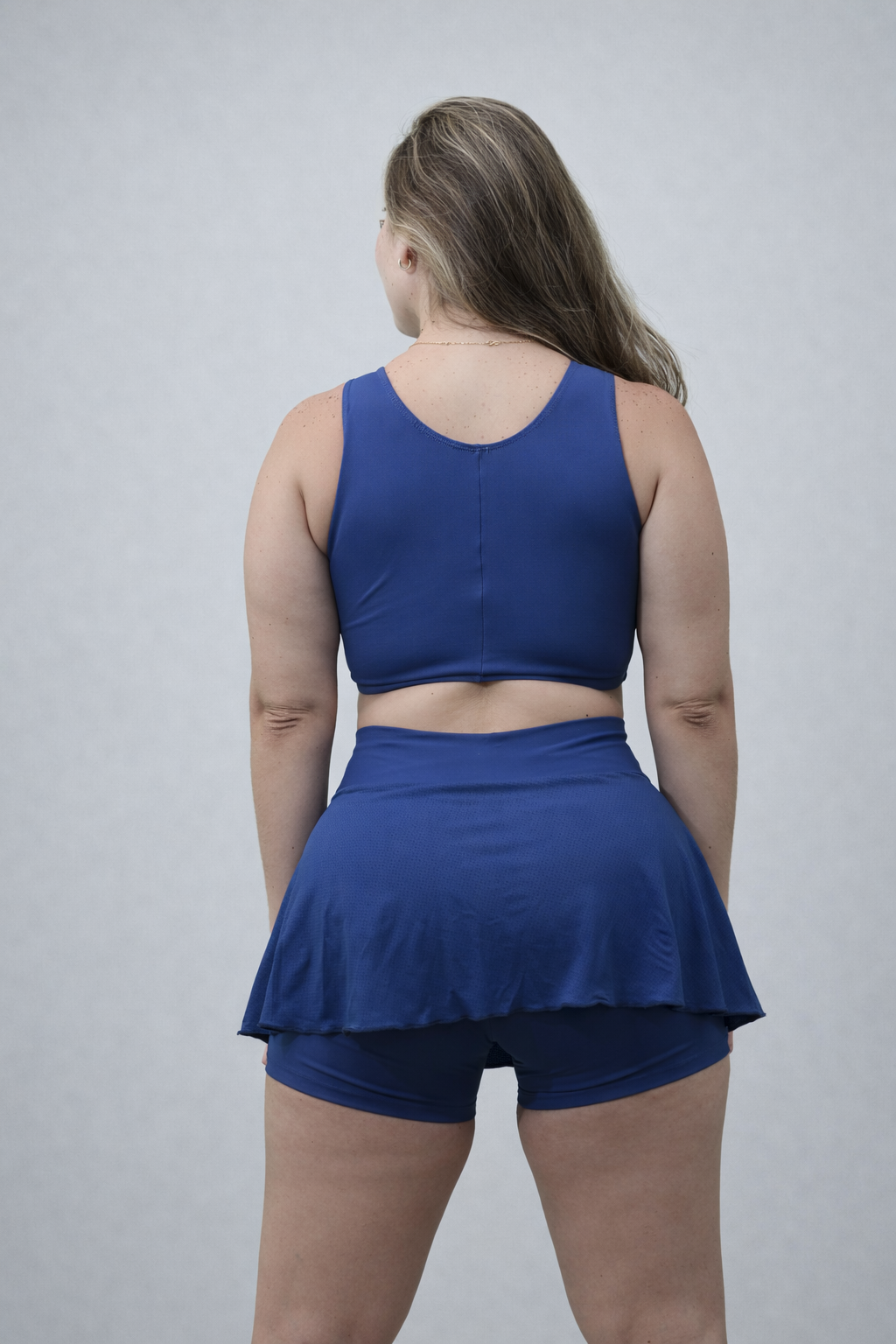 Top Ginastica + Shorts Saía